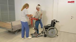 How to transfer a user from a wheelchair to a bed using a Molift Raiser Pro [upl. by Solitta596]