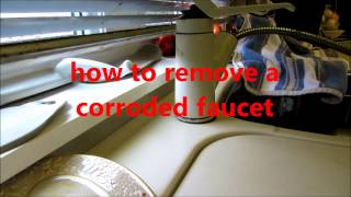 plumbing how to remove a corroded kitchen sink faucet [upl. by Inoek56]