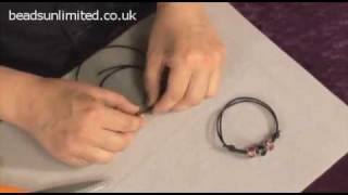 Bracelet on Leather  The Beginners Guide to Beading [upl. by Deppy553]