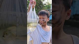 Kindly poor man save fish with helmet trending viralvideo shorts shortsfilm fish shortsvideo [upl. by Iolande464]