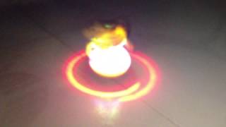 Musical Spinning Flashing Light Lattu Teetotum battery operated toy [upl. by Guimar137]