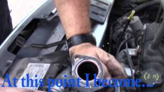 How To Replace the Thermostat on a 2005 Chrysler Town and Country Van [upl. by Ocker300]