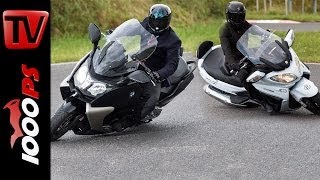 Suzuki Burgman 650 vs BMW C 650 GT  Scooter Battle [upl. by Buonomo904]