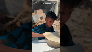 Palestinian child recites Quran while preparing bread [upl. by Lorant]