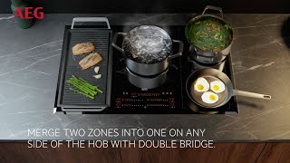 6000 Bridge Induction Hob AEG Hobs [upl. by Enyallij566]