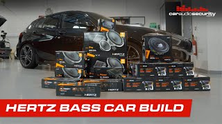 Hertz Equipped Car Audio Bass Build in a BMW 1 Series Car Audio amp Security [upl. by Mendez]