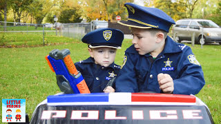 Little Heroes search for their pretend play police gear [upl. by Nueoras]