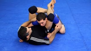 How to Do the Triangle Choke  MMA Fighting [upl. by Artinek]