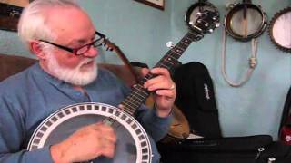 Tuning a banjo and adjusting the bridge placement [upl. by Rivi]