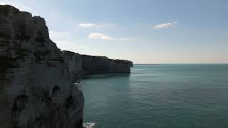 “Etretat Cliffs from Above A Serene Aerial View on a Sunny Day [upl. by Neslund]