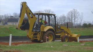 Cat® F2 Backhoe Loaders at Work North America [upl. by Dyrrej]