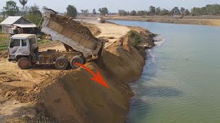 Superb Action Dozers D6oP Use Multiple Dump Trucks Filling Soil in Canal For Resize Road [upl. by Jamill872]