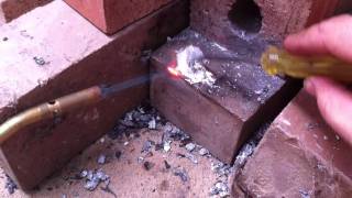 Melting aluminium cans with a propane torch [upl. by Ennyletak]