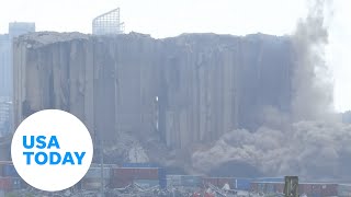 Beirut grain silo crumbles two years after port explosion  USA TODAY [upl. by Vokay]