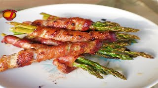 Bacon Wrapped Asparagus on the Blackstone Griddle  Blackstone griddle sides  appetizers [upl. by Ynnattirb]