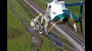 Helicopter Transfering Lineman to Wire [upl. by Zigrang]