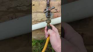 How to prime a garden hose to siphon water [upl. by Aeslehs]