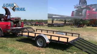 Loading ATVs on a Load Trail Single Axle Trailer with Front Ramp Gate and Rear Fold Gate [upl. by Letnahc161]