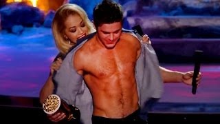 Zac Efron Strips Down At The 2014 MTV Movie Awards [upl. by Akitnahs]