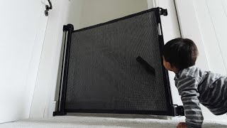 Momcozy Retractable Baby amp Pet Gate  Installation [upl. by Oirevas]