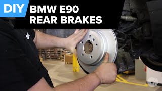 How To Replace BMW E90 Rear Brakes 328i Pads Rotors Sensors FCP Euro [upl. by Lew]