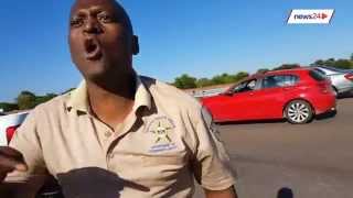 WATCH Gauteng cop shoves motorist during roadside altercation [upl. by Wesla]