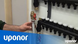 Installation uppfyllning och avluftning av Uponor Pro 1 QampE golvvärmefördelare i fördelarskåp [upl. by Ahsinom]