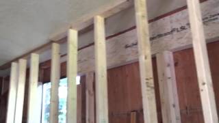 How to install a beam into a load bearing wall [upl. by Lalaj]