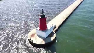 Menominee North Pier Lighthouse Closeup aerialand imagery [upl. by Darej]