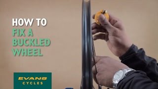 How to fix a buckled wheel [upl. by Mulry]