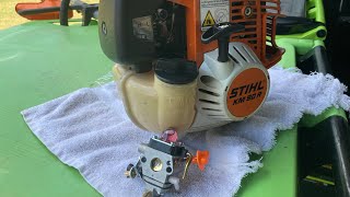 How to replace the carburetor on a Stihl FS90R 100RX 110 130 4Mix trimmer [upl. by Esinereb]