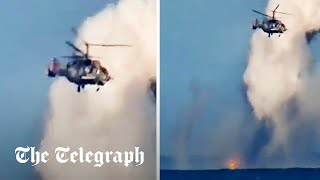 Russian helicopter battles upgraded Ukrainian sea drone armed with surfacetoair missile [upl. by Anaili]