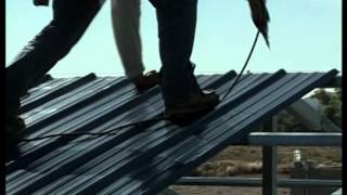 Metal Building Installation Step 19 Roof Panels [upl. by Atiuqa304]