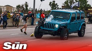 Jeep mows into Black Lives Matter march before protester fires gun injuring two people in Colorado [upl. by Torrance]