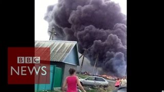 MH17 New footage shows crash aftermath  BBC [upl. by Freida484]