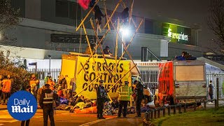 Extinction Rebellion XR protesters block roads outside national newspaper printing presses [upl. by Malarkey481]