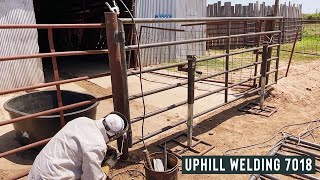 HANGING A GATE WITH 7018 UPHILL [upl. by Okoyik792]