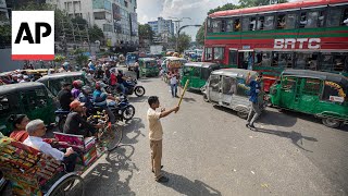 Bangladesh residents react to political transition after PM Sheikh Hasina resigns [upl. by Tierney]