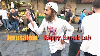 First day of Hanukkah Manane Yehuda Market is full of life [upl. by Eiramnerual]