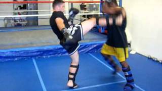 Muay Thai Technique  Defense Against Kick to Head [upl. by Schlessel909]