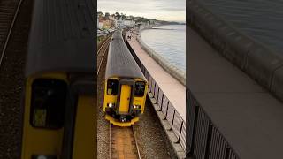 GWR class 150 Exmouth to Paignton clatters along the seawall at Dawlish 150219150266 DMUs [upl. by Barbara]