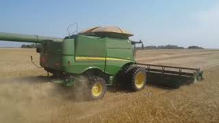 S670 harvesting wheat 2024 Mentmore MB [upl. by Ahsinroc104]