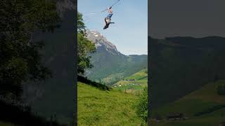 Person is doing highline freestyle tricks while bouncing around 6m up and down [upl. by Hayward]