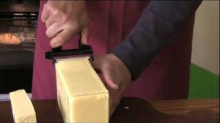 Slicing cheese using the dinkidi peeler [upl. by Jordon]