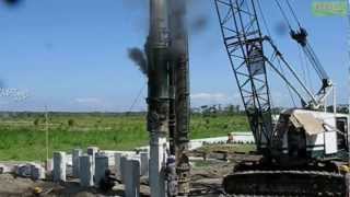 Link Belt Diesel Powered Pile Driver Hammer Working [upl. by Odanref672]