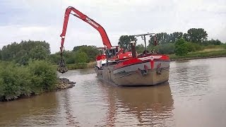 Baggerschiff quotNeptunusquot mit Sennebogen 835  Dredger quotNeptunusquot with excavator Sennebogen 835 [upl. by Catherina272]