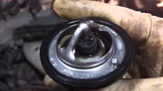 how change thermostat 2005 nissan sentra [upl. by Ikciv863]