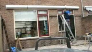 Van Dam zonwering Montage knikarmscherm [upl. by Claudian]