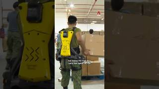 SAF soldiers use exoskeleton suits to prepare NDP packs [upl. by Ahsekat]