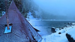 Hot Tent Camping In A Snowstorm [upl. by Ashbey]